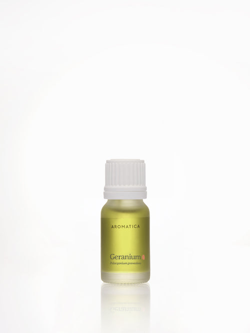 Aromatica Geranium essential oil in an olive-green bottle with a white cap and small coral accent on the front