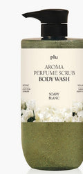 PLU Sophie Blanc scrub body wash close-up, showing a black pump, cream floral label and green speckled liquid