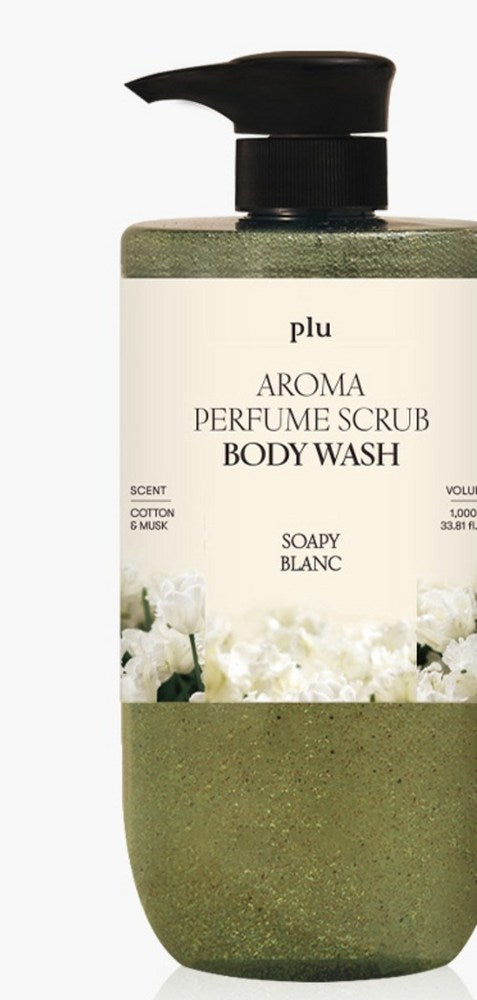 PLU Sophie Blanc scrub body wash close-up, showing a black pump, cream floral label and green speckled liquid