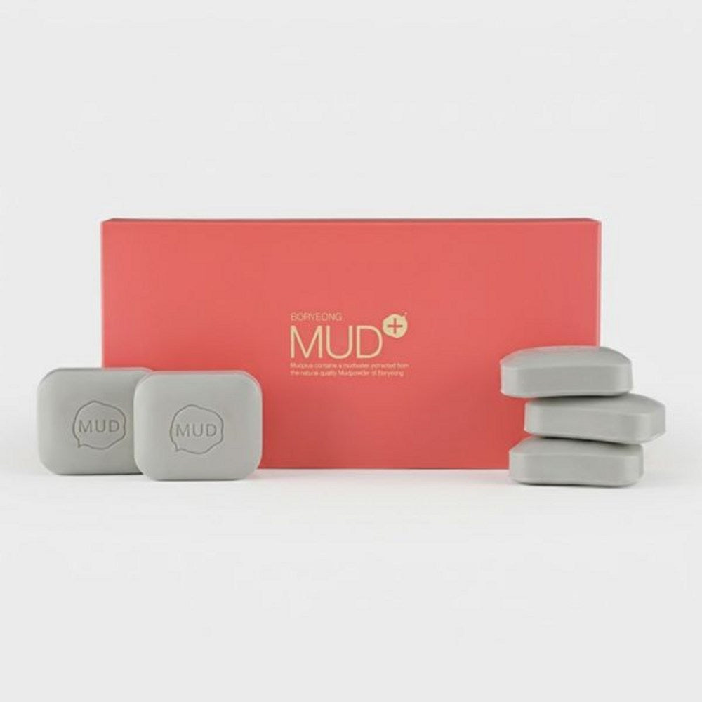 Boryeong Mud Soap displayed as five grey rounded bars, two upright and three stacked beside a red box
