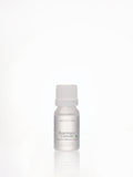 Aromatica Rosemary Cineol essential oil in a frosted bottle with a white ribbed cap, reflected on a white surface