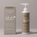 Boryeong Mud scalp shampoo in a beige-labelled white pump bottle beside a matching tall carton