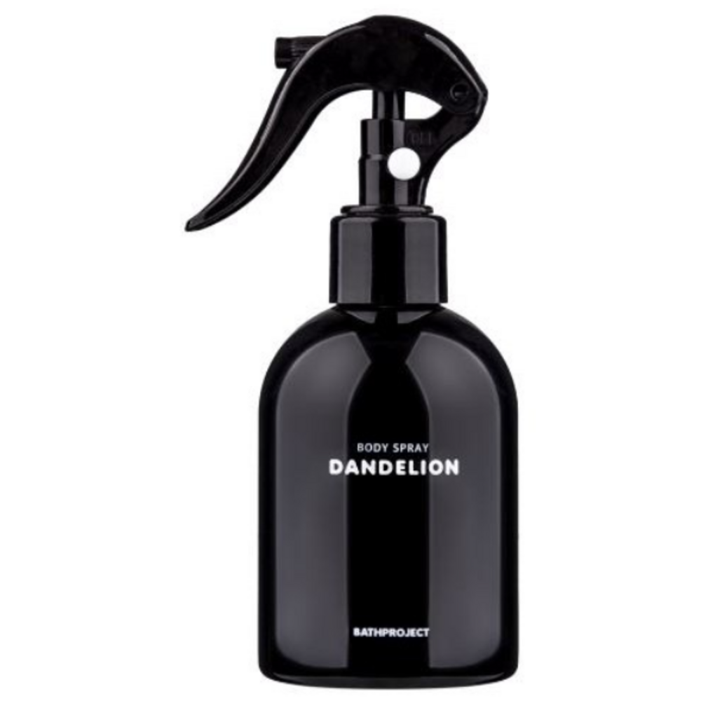 Bath Project Dandelion body spray in a glossy black bottle with a curved trigger and white lettering