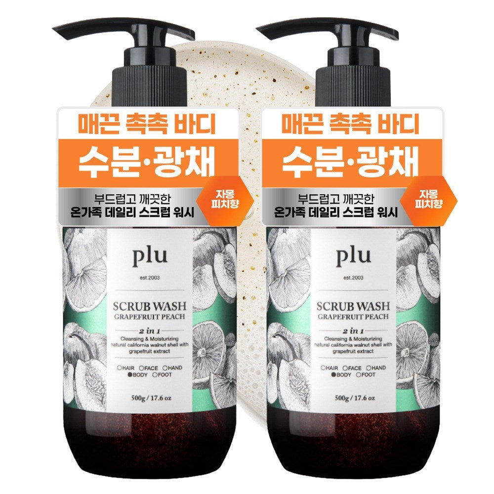 Two PLU body scrub wash pump bottles with grapefruit peach labels and orange Korean promotional panels