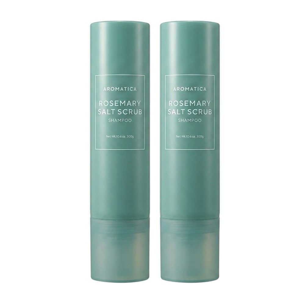Aromatica Rosemary Salt Scrub Shampoo set with two tall green cylindrical bottles standing side by side