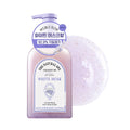 Veilment White Musk body wash lavender pump bottle beside a pale scrub texture swirl and Korean neck label