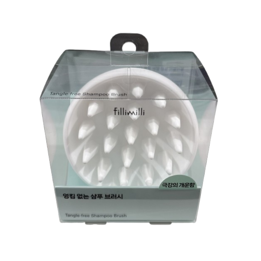 Fillimilli shampoo brush with white pointed bristles inside a clear box, viewed from the front