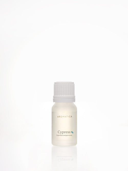 Aromatica Cypress essential oil in a pale frosted bottle with a white cap, grey lettering and a blue-green accent
