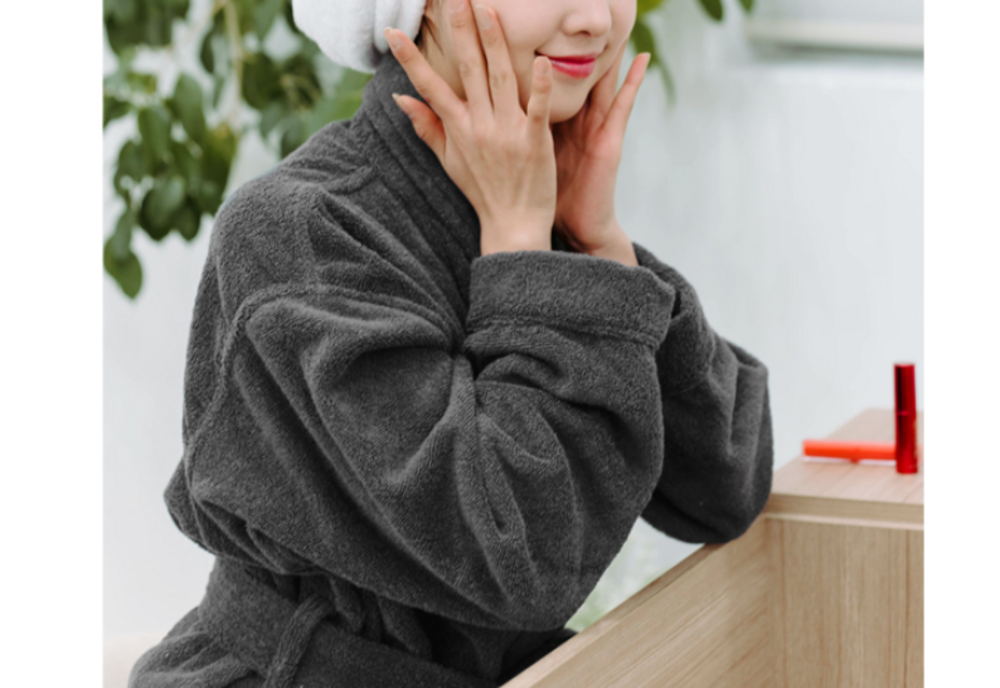 Songwol Gray Hotel Bathrobe XL worn at a wooden vanity by a woman with a white towel around her hair