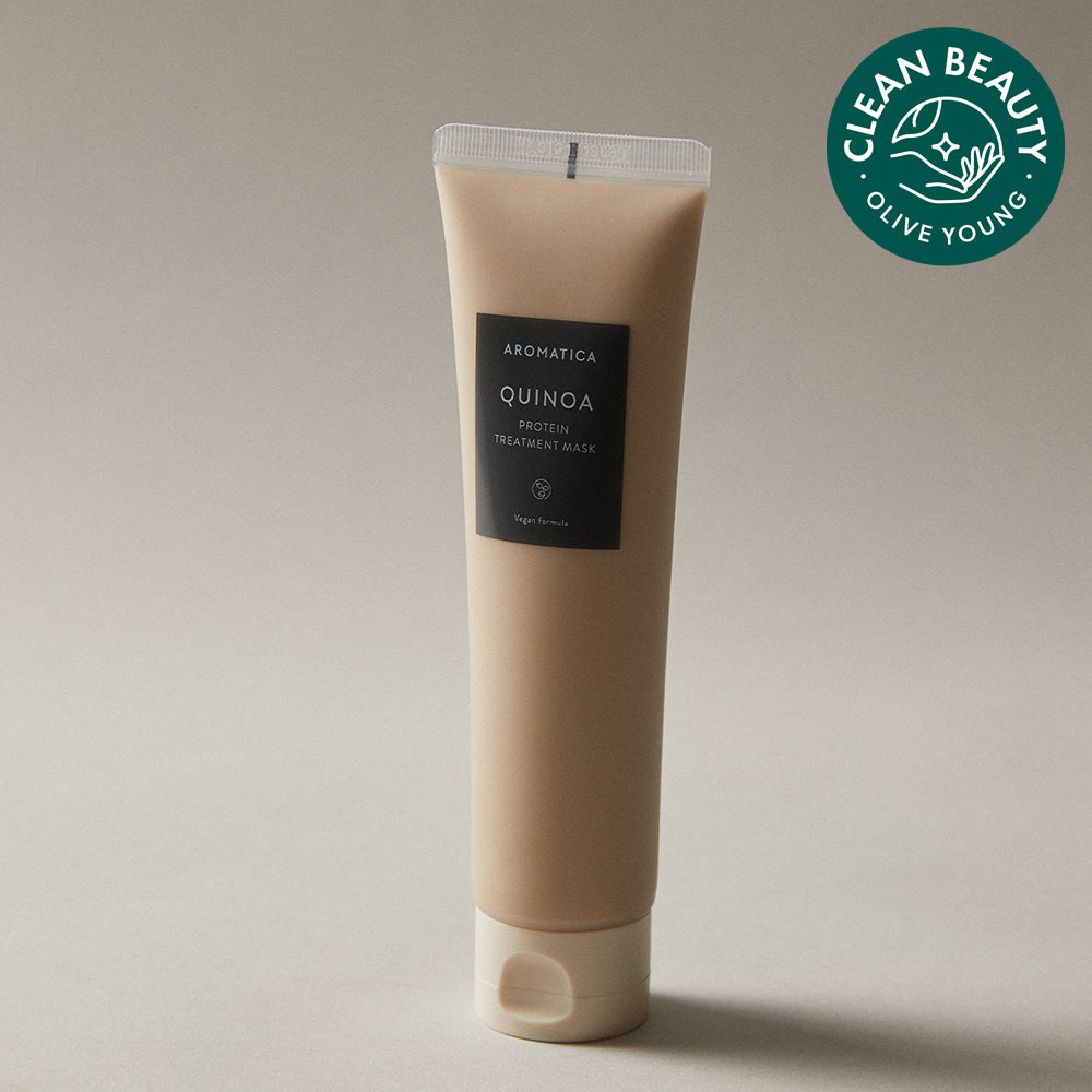 Aromatica Quinoa Protein Treatment Mask standing on a beige surface beside a green Olive Young Clean Beauty badge
