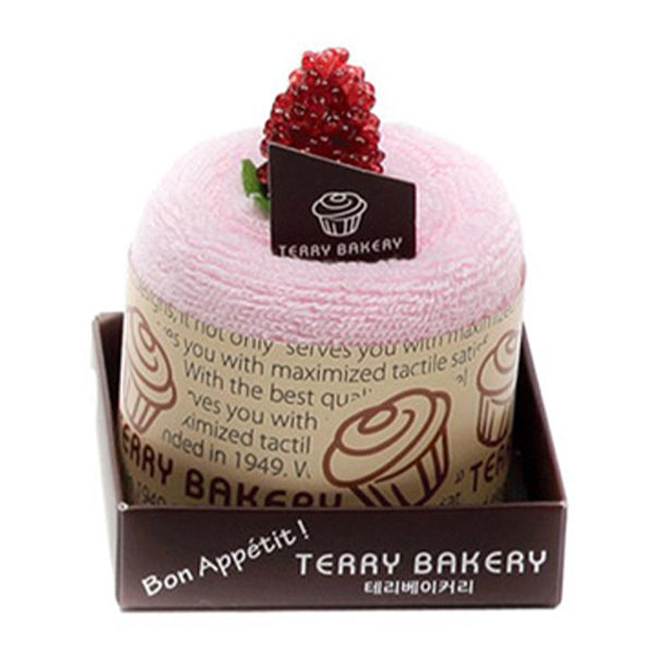 Songwol Mini mousse cake towels shown as a pink round towel with a red topping in a brown bakery tray