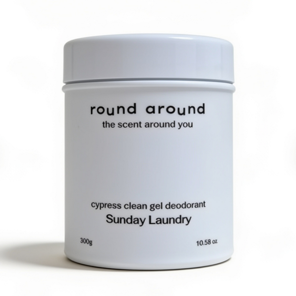 Round Around hinoki deodorizer in a white 300g jar with a matching lid and black Sunday Laundry lettering
