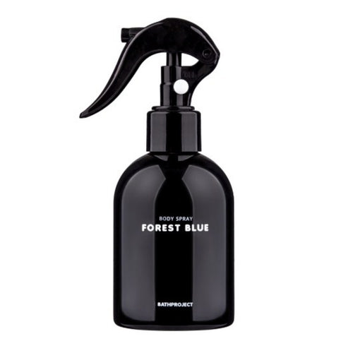 Bath Project Forest Blue body spray in a glossy black bottle with a curved trigger dispenser on white