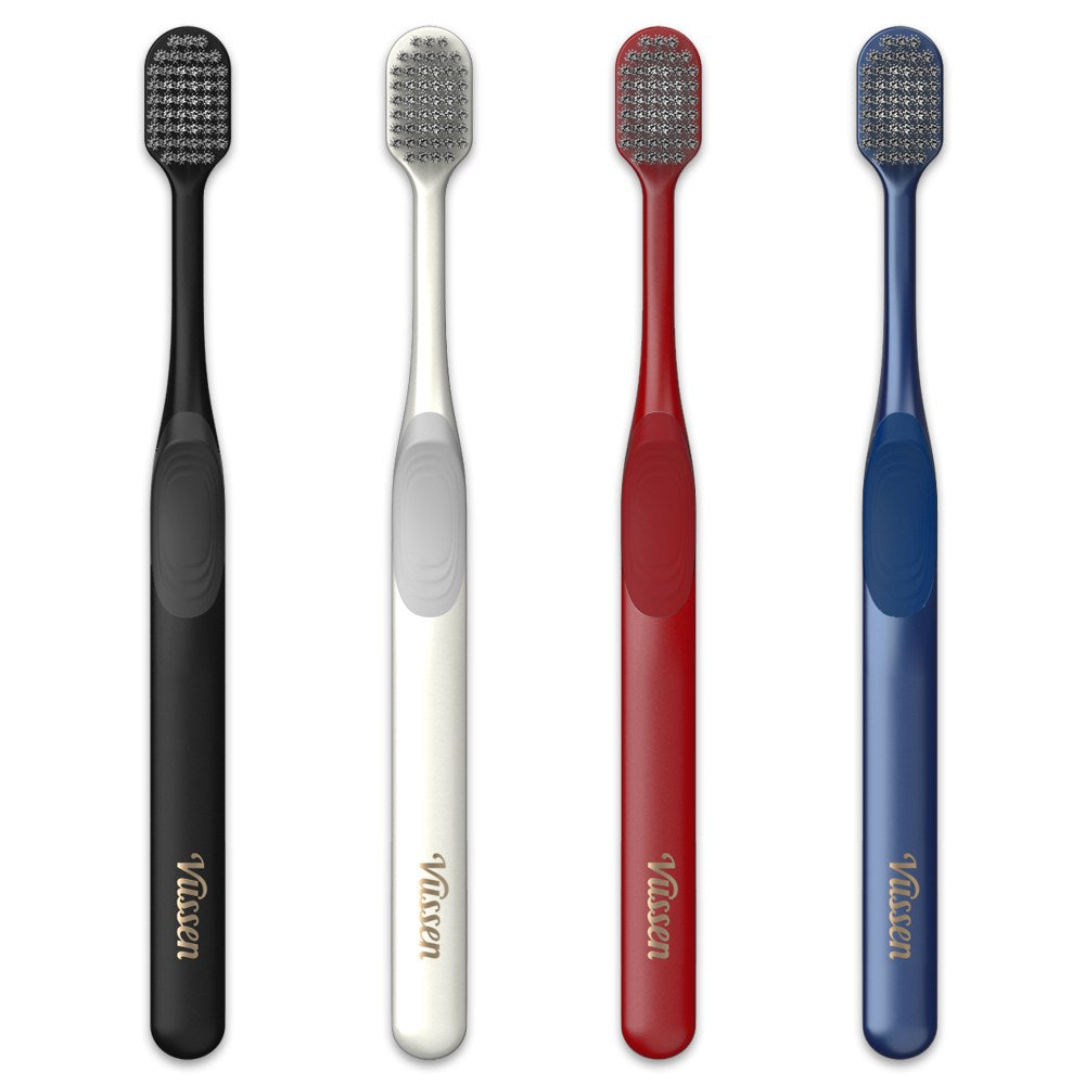 VUSSEN toothpaste set range photo showing black, ivory, red and navy toothbrushes with textured handle grips