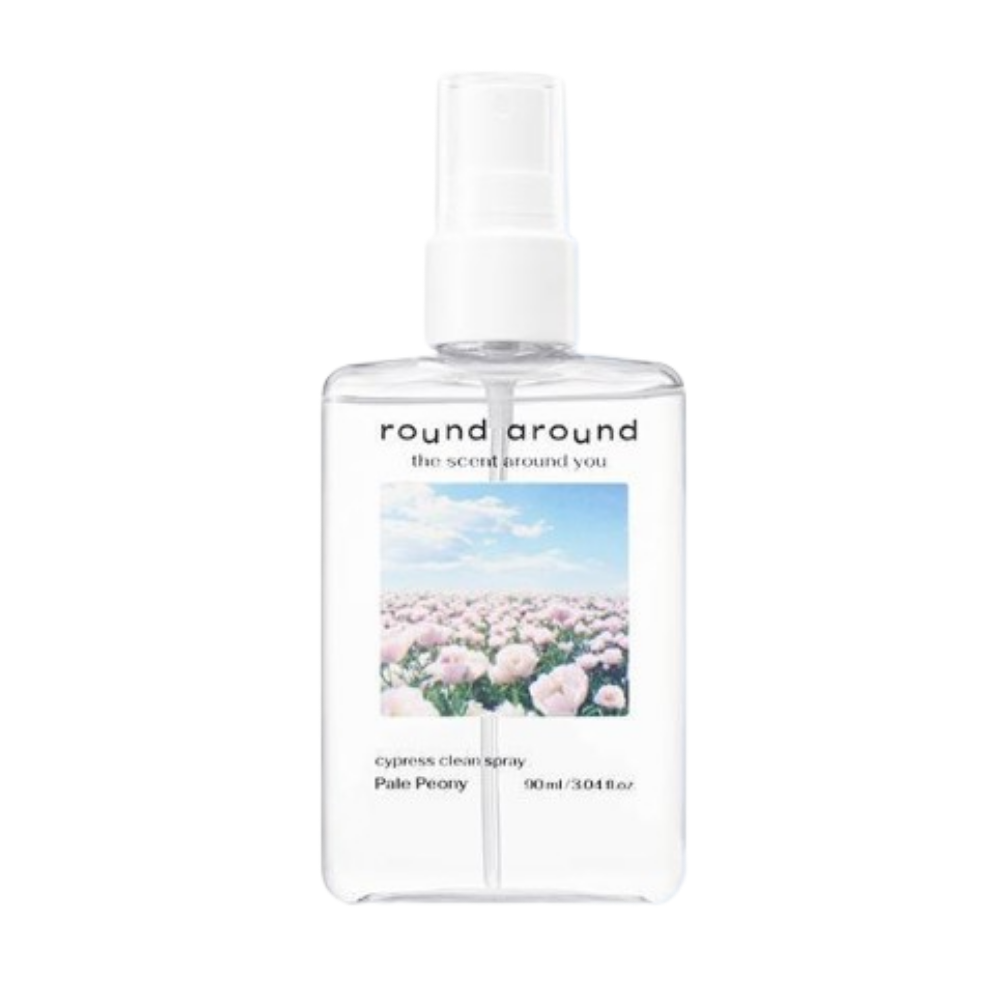 Round Around Pale Peony linen spray in a clear rectangular bottle with a white pump and pink flower field label
