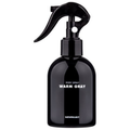Bath Project Warm Gray perfume spray in a glossy black bottle with a curved trigger and white lettering