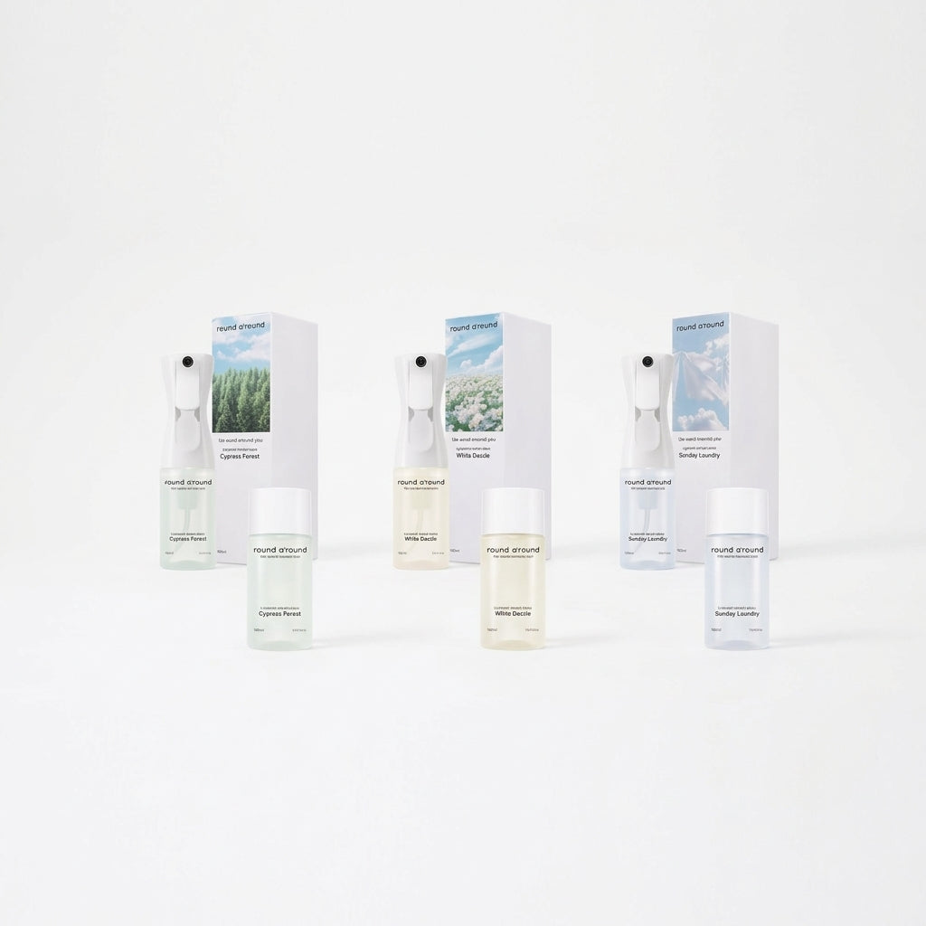 Round Around Hinoki Clean Spray range with three boxed sprays and three capped bottles, including Sunday Laundry