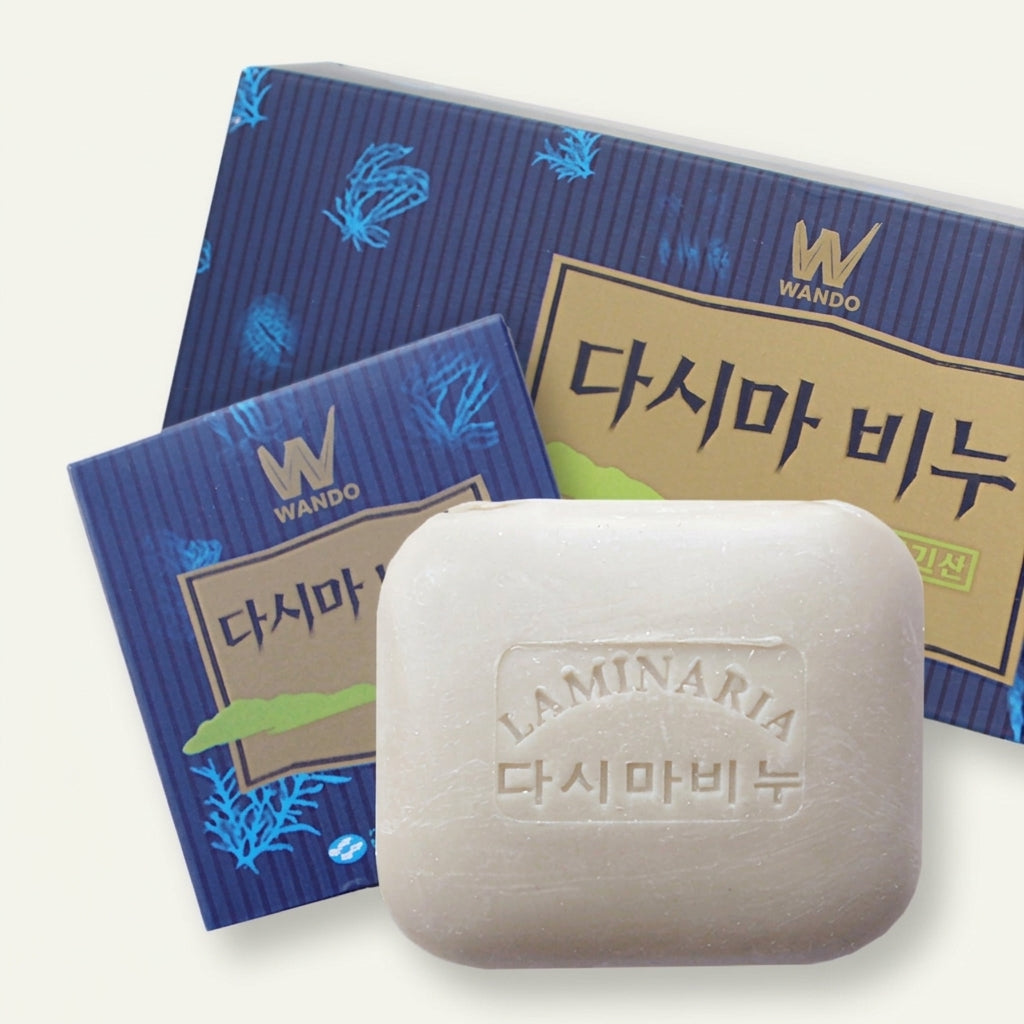 Tojongwon Wando kelp soap bars shown as a pale embossed bar in front of blue seaweed-patterned packaging