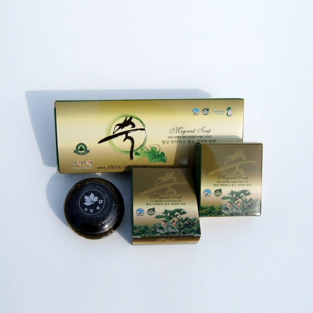 Tojongwon mugwort soap bar shown as a dark round wrapped bar beside green and gold boxes with herbal graphics
