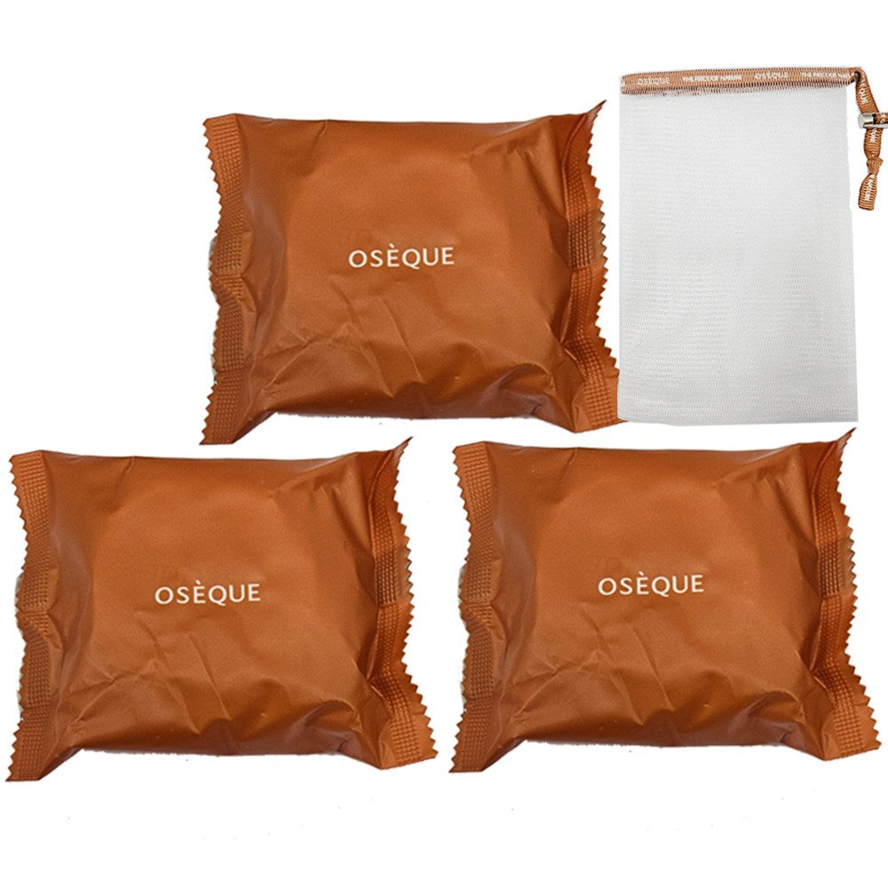 OSEQUE yellow earth soap set with three brown individually wrapped bars and a white mesh foam net